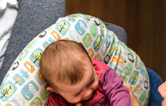 when to stop using breastfeeding pillow